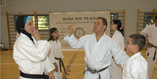 Danny Hakim with some of the members of Budo for Peace.