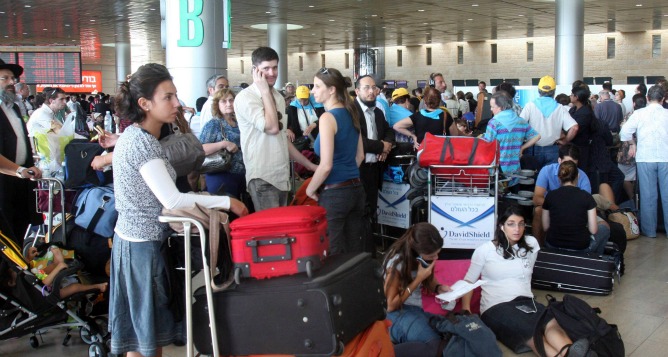 Travelers stuck at Ben Gurion Airport during a strike.  Photo by Roni Schutzer/Flash90
