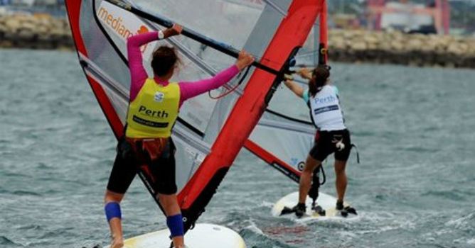Lee Korzits rounds a mark in the first Gold Fleet race in the RS:X women's windsurfer class at the ISAF World Sailing Championships off Fremantle near Perth on December 8, 2011. Photo by GREG WOOD/AFP/Getty Images