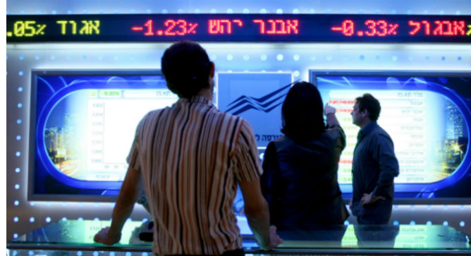 Traders anxiously follow stock fluctuations at the Tel Aviv Stock Exchange. Photo by Moshe Shai/Flash90.