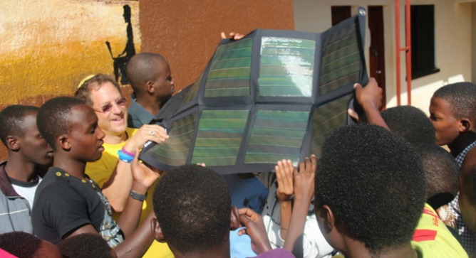 Wearing his signature yellow kippah, Abramowitz teaches about solar power in the Agahozo Shalom Youth Village in Rwanda.
