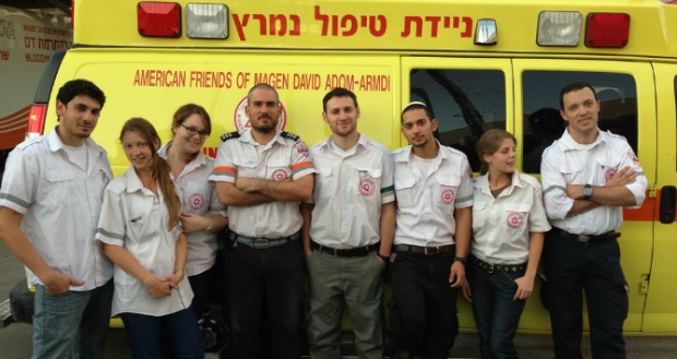 (File photo) Paramedics-in-training from Ben-Gurion University of the Negev arenâ€™t in class during the conflict, so they are volunteering with the local ambulance squad. Coordinator Oren Wacht is in the middle. Photo courtesy of Ben-Gurion University