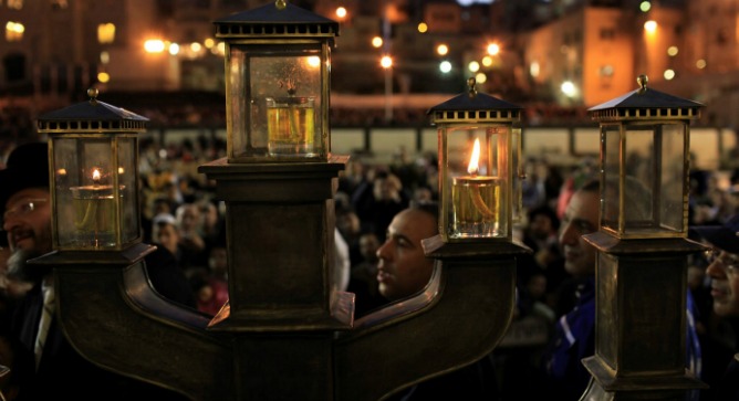 A hannukiyah lights up the cold winter night in Jerusalem. Photo by Flash90.