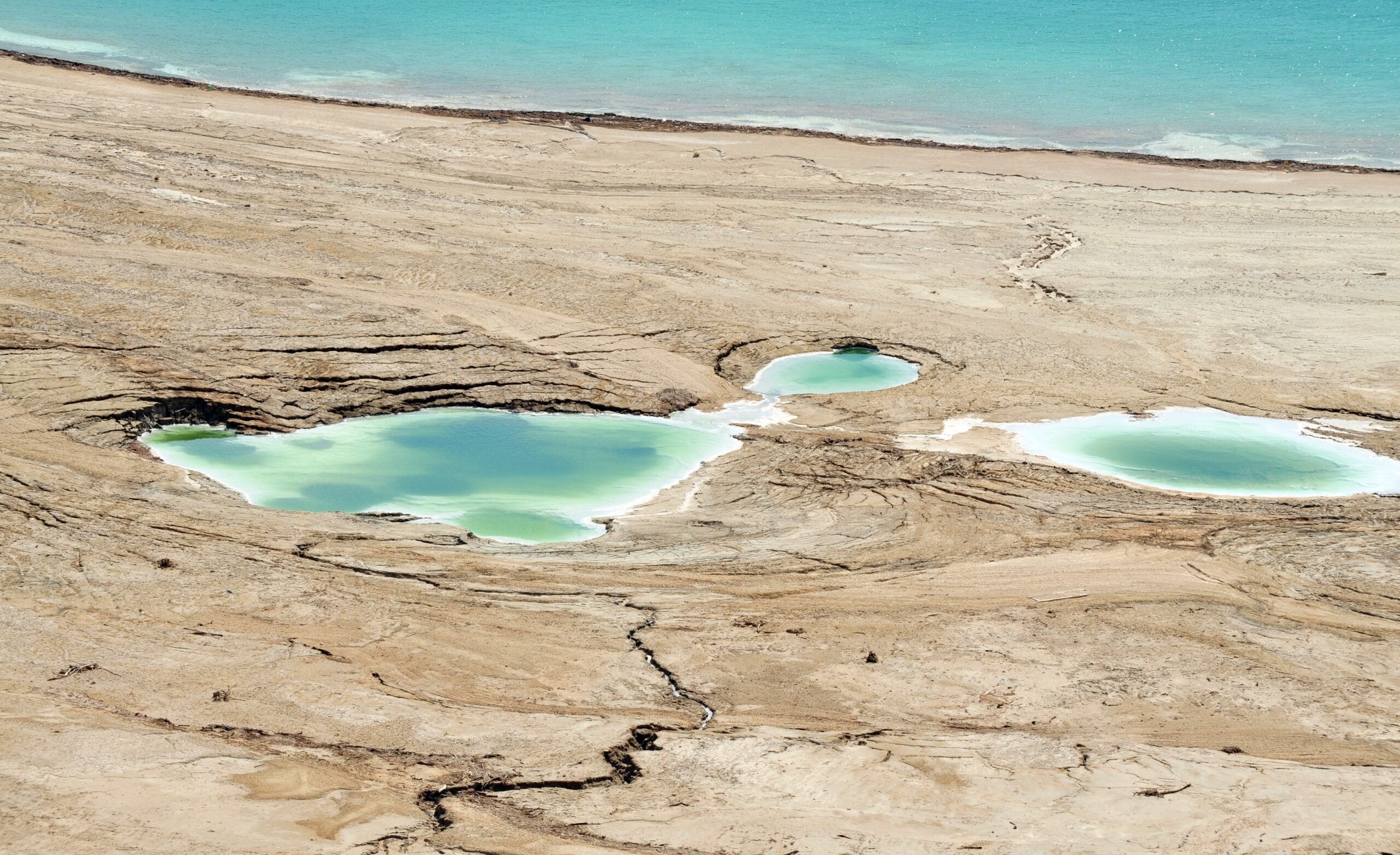 The Dead Sea's shore has been receding over the years and causing sink holes along its shore. (Shutterstock.com)