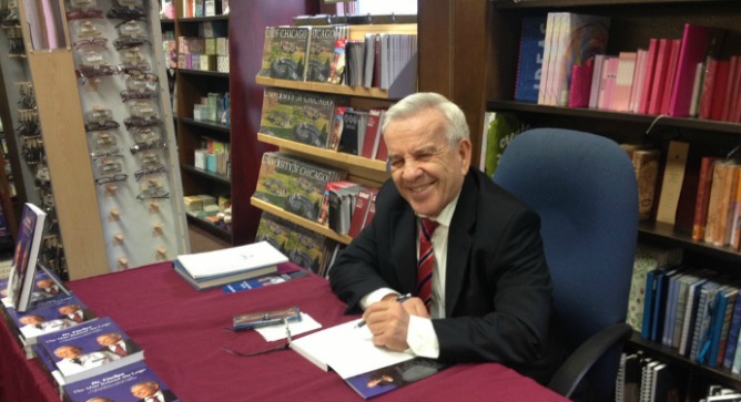 Dr. Eli Fischer signing copies of his autobiography at Barnes & Noble Bookstore at the University of Chicago.