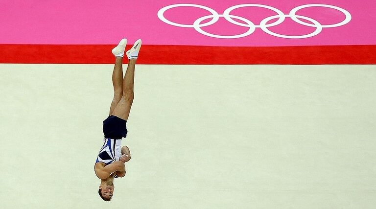 Alexander Shatilov competes on the floor in the Artistic Gymnastics Men's Floor Exercise final at the London 2012 Olympic Games.