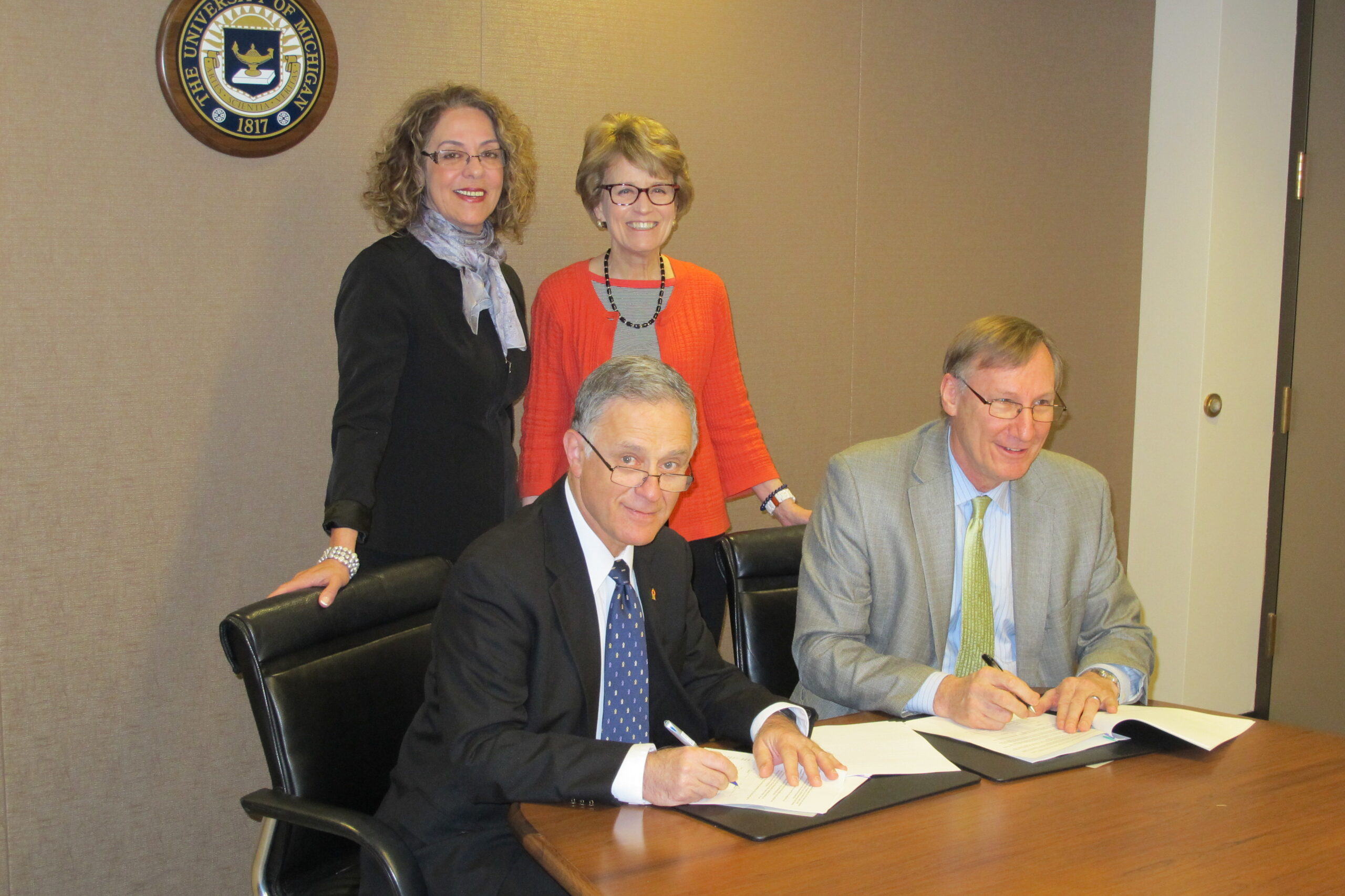 BGU Vice President and Dean for Research and Development Moti Herskowitz, U-M Vice President for Research Stephen Forrest, Ben-Gurion President Rivka Carmi and U-M President Mary Sue Coleman sign MoU. (Photo: Scott Soderberg, Michigan Photography)