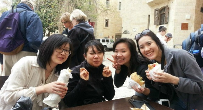 IIP students Shih-Why Lin, Meiling Liu,Myrna Handoko and Tar Naruporn Ananpongsuk having a taste of shwarma and falafel during their trip to Israel.