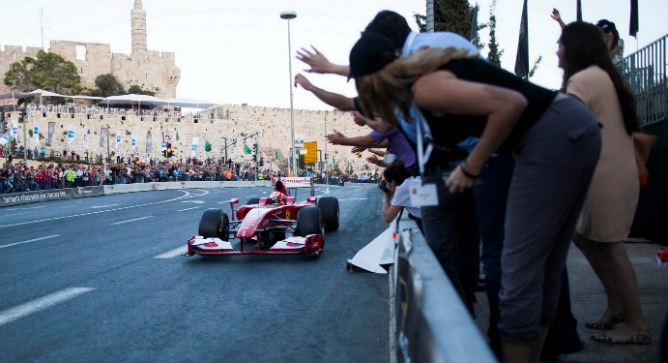 A Formula One driver zooms past Jerusalemâ€™s historic Tower of David. Photo by Flash90.