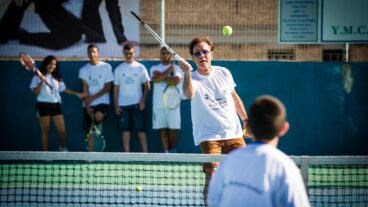 Sir Cliff Richard plays tennis with Arab and Jewish youth at the Nazareth Tennis School. (David Katz)