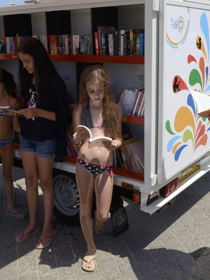 No need to stain your favorite book with sunscreen splotches, the city has you covered with its new beach library. (Malovani Israel)