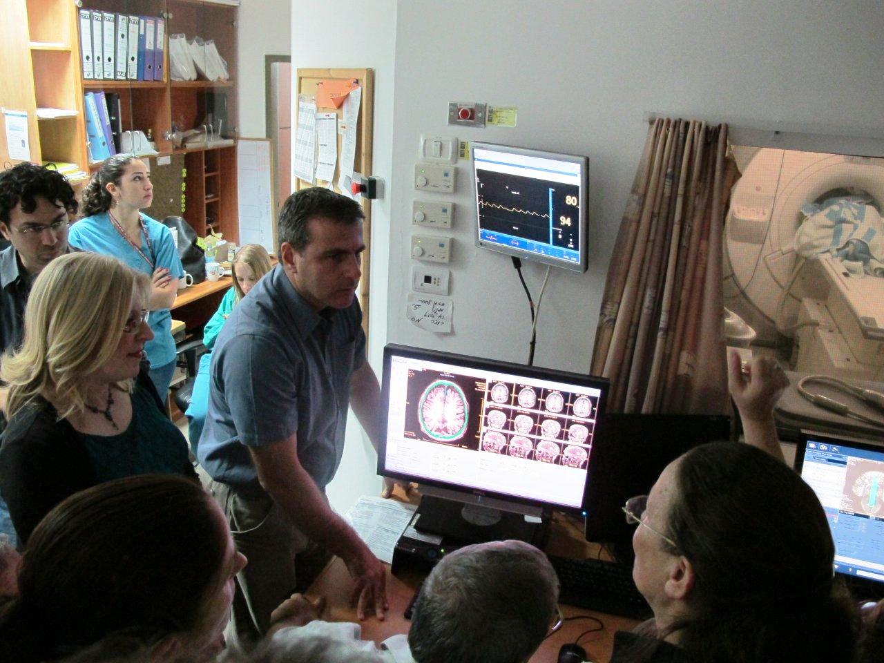 Rambam staffers monitoring Sami Zangiâ€™s groundbreaking guided ultrasound treatment.