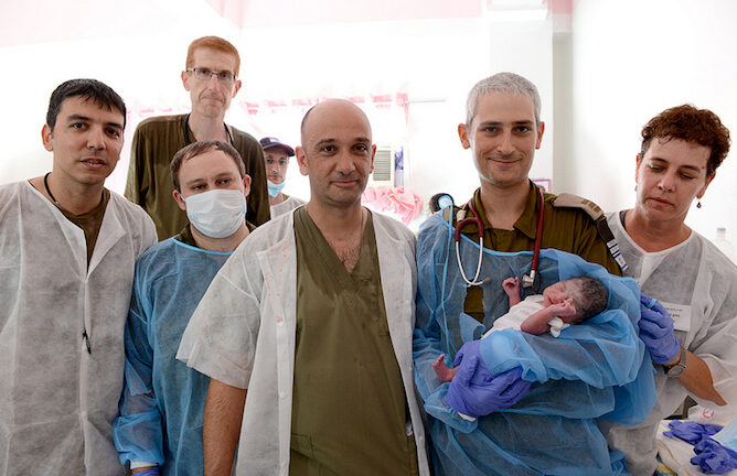 Meet the first baby born at the IDF Rescue Mission's field hospital in the Philippines the wake of Typhoon Haiyan. Photo Credit: IDF Spokesperson's Unit