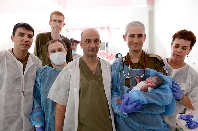 Meet the first baby born at the IDF Rescue Mission's field hospital in the Philippines the wake of Typhoon Haiyan. Photo Credit: IDF Spokesperson's Unit