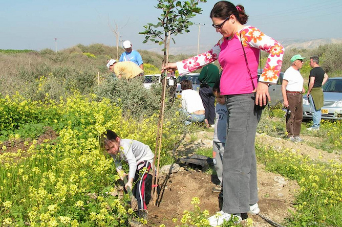 Planting a tree for Tu Bâ€™Shvat.