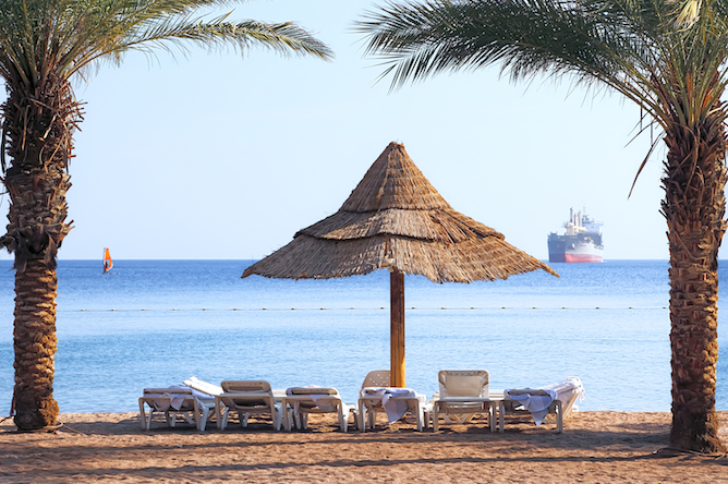 The photo of a beach in Eilat is by Shutterstock.com.