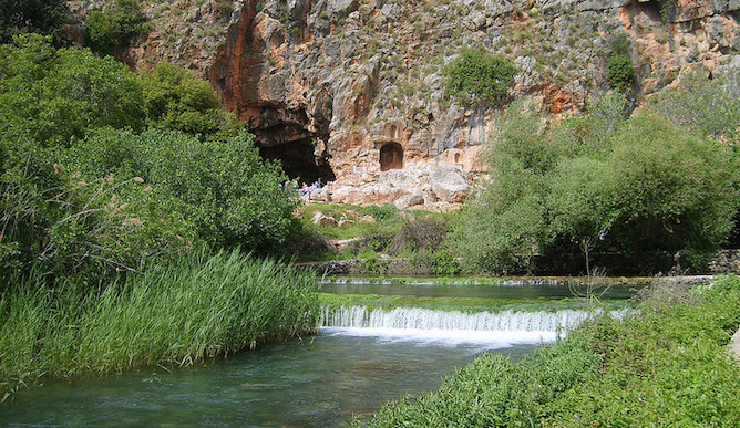 In the background of the Banias Spring is Pan's Cave, where the waterway originated in ancient times. Photo courtesy of Wikimedia Commons