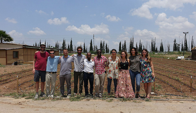The Fellows meeting with Ethiopian Israelis, learning how they use community gardens as tools of economic empowerment.