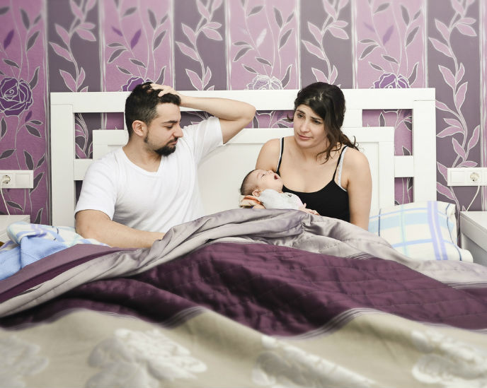 Parents of newborns pay a price for frequent night-wakings. (Shutterstock.com)