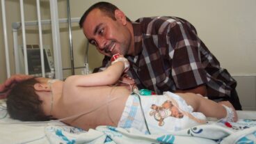Wisam and his dad at Wolfson Medical Center.