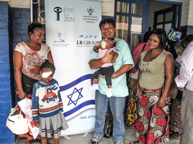 Eye from Zion founder Nati Marcus with patients outside the Kinshasa hospital.