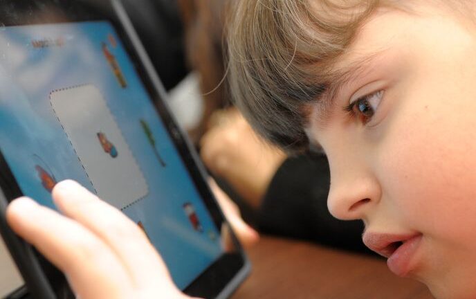 A child playing with the winning games app at Beit Issie Shapiro.