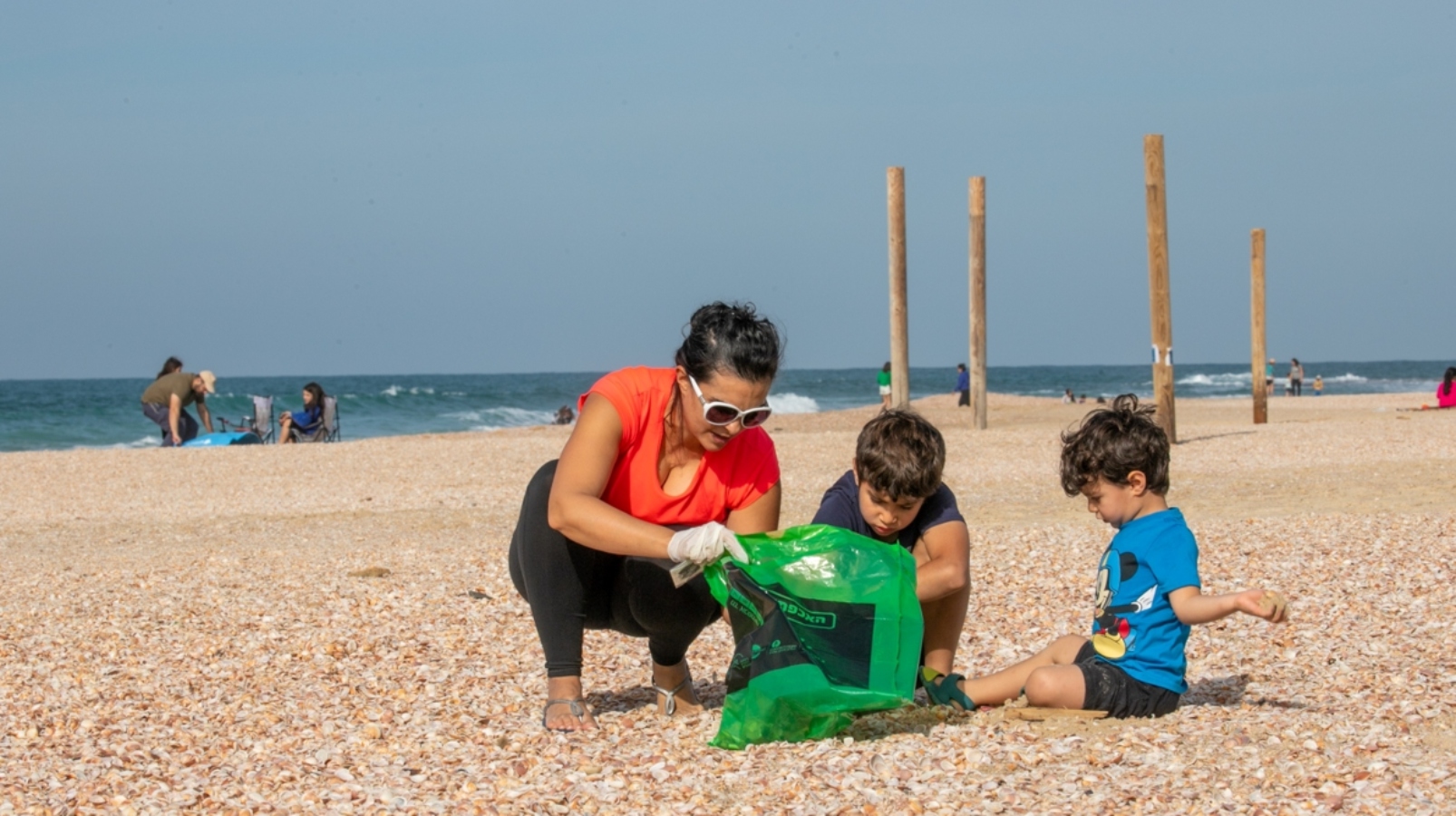 Make your next visit to Israel more eco-friendly by cleaning up beaches, opting for bikes or trying your hand at foraging. Photo by Yossi Aloni/Flash90