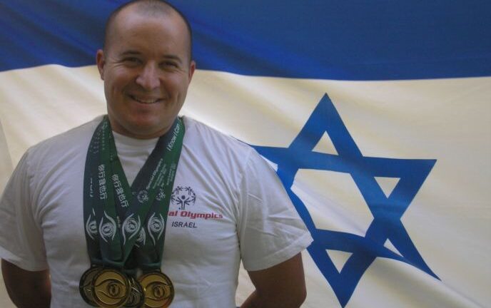 Mati Oren with his four medals at the Shanghai Special Olympics World Games in 2007.