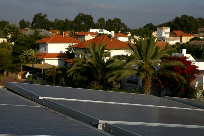 Solar panels on the roof of a home in Israel. Photo by Flash90.