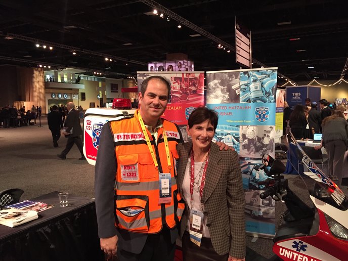 ISRAEL21c President Amy Friedkin with Eli Beer, founder of United Hatzalah, at the AIPAC conference in Washington.