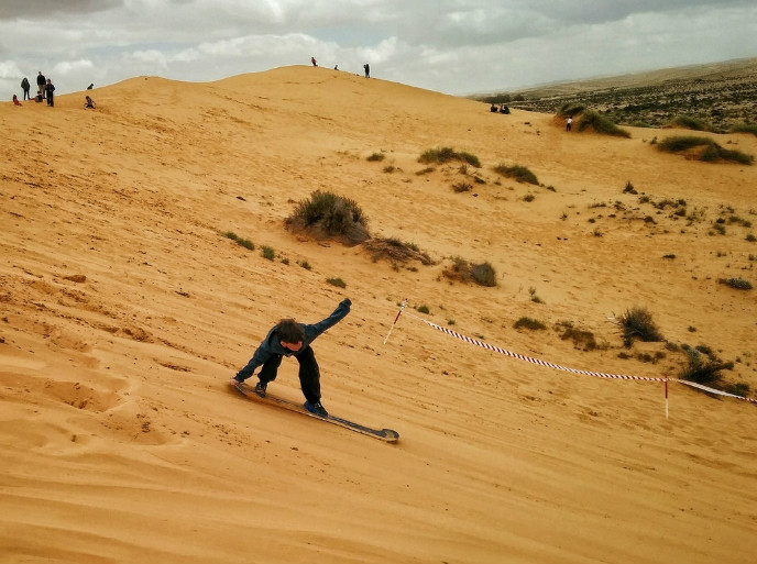 Kids love sandboarding in the Negev. Photo by Viva Sarah Press