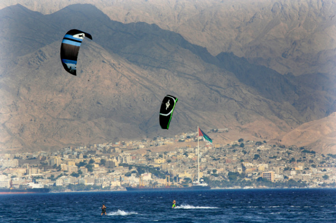 Paragliders in the Gulf of Aqaba with Jordan in the background. Photo by NatiShohat/FLASH90
