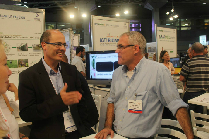 Avi Hasson, chief scientist in the Ministry of Economy, speaking with Quiet Therapeuticsâ€™ Ron Lahav at IATI Biomed 2015.