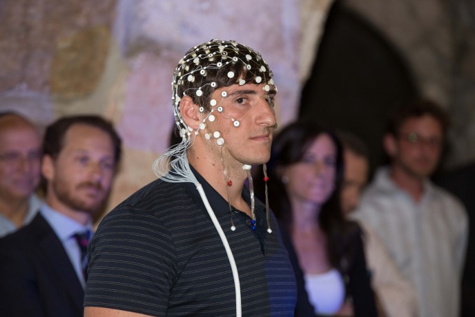 Israel Football League quarterback Alex Swieca wearing an Elminda device. Photo by Herschel Gutman
