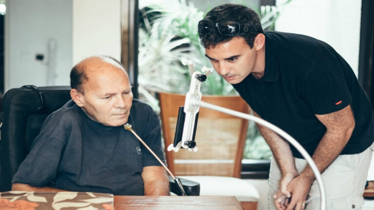 Sesame Enable CEO Oded Ben-Dov showing how to use the gesture-recognition phone. Photo: courtesy