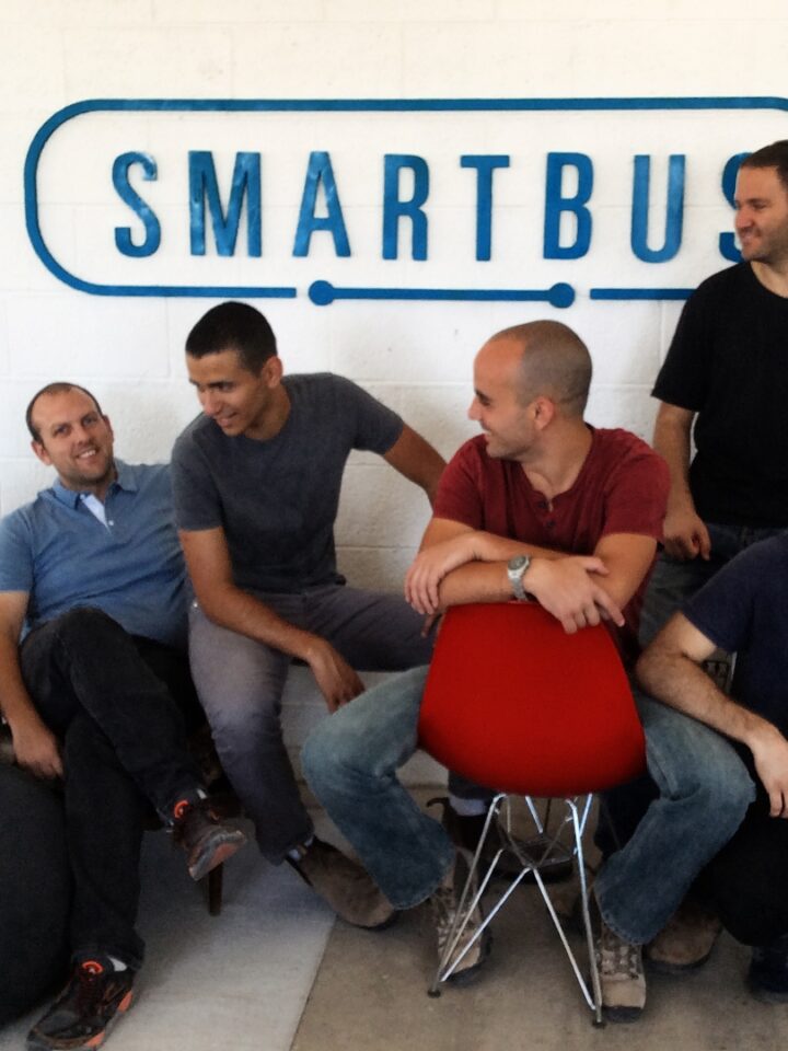 Yishai Cohen (middle, in gray shirt) with the SmartBus crew in Jerusalem. Photo courtesy of SmartBus