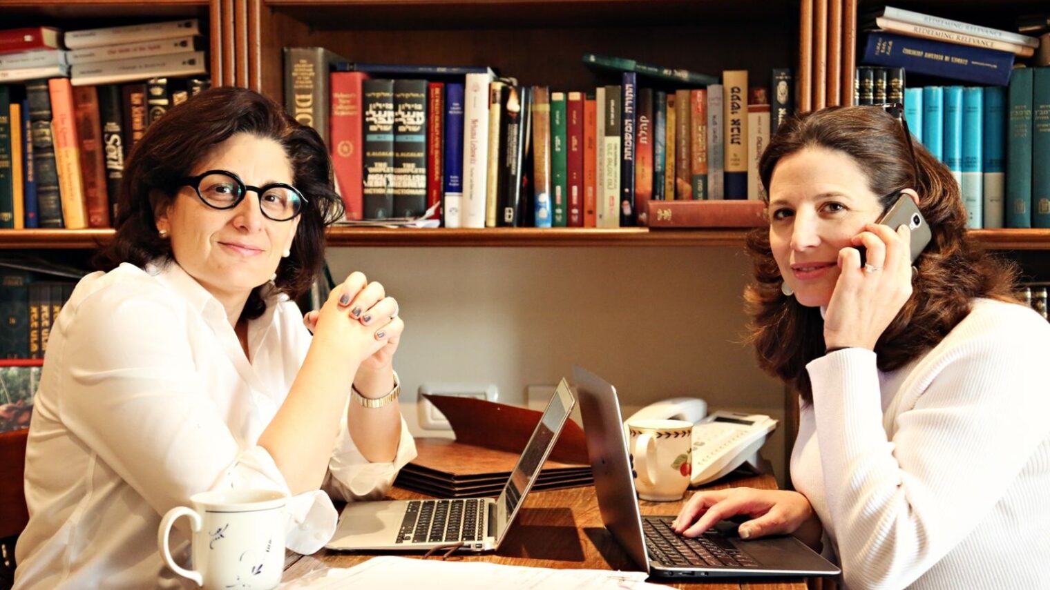 Naomi Brounstein, left, and Vivi Mann working on Ten Gav. Photo by Hindy Lederman