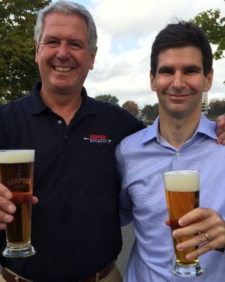 Harpoon President Charlie Storey, left, sharing a brew with Desalitech CEO Nadav Efraty next to Boston’s Charles River. Photo: courtesy