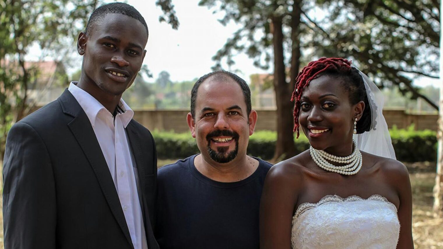 Gilad Millo with theater director Catherine Enane and dancer Tony Toselito Tosedo during the shooting of the music video for his song Sema Milele. Photo via Facebook