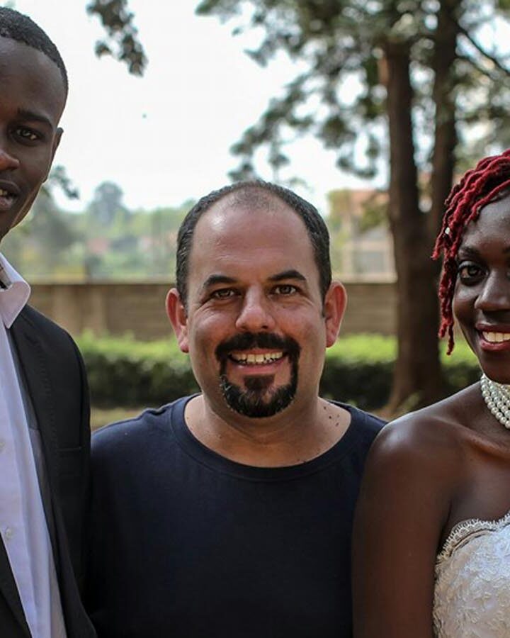 Gilad Millo with theater director Catherine Enane and dancer Tony Toselito Tosedo during the shooting of the music video for his song Sema Milele. Photo via Facebook