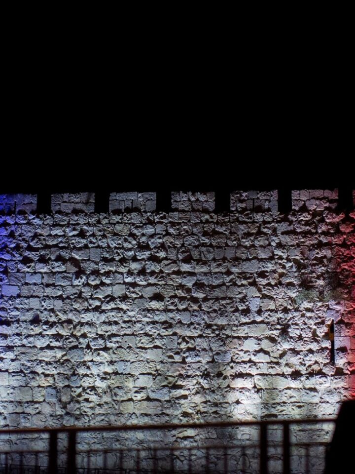 The walls of the Old City in Jerusalem were lit up in red, white and blue in solidarity  with the French. Photo ByYonatan Sindel/Flash90