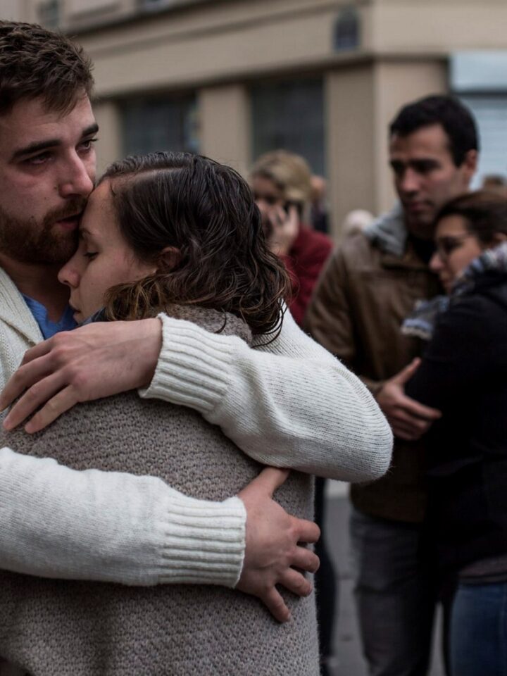 Parisians console each other in the wake of Friday’s massive terror attacks. Photo by Laurence Geai/Flash90