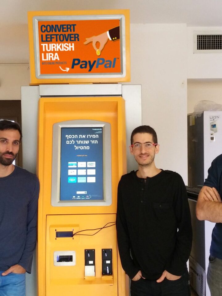 TravelersBox founders, from left, Dror Bluementhal, Idan Deshe and Tomer Zussman at one of its kiosks in Istanbul. Photo courtesy of TravelersBox