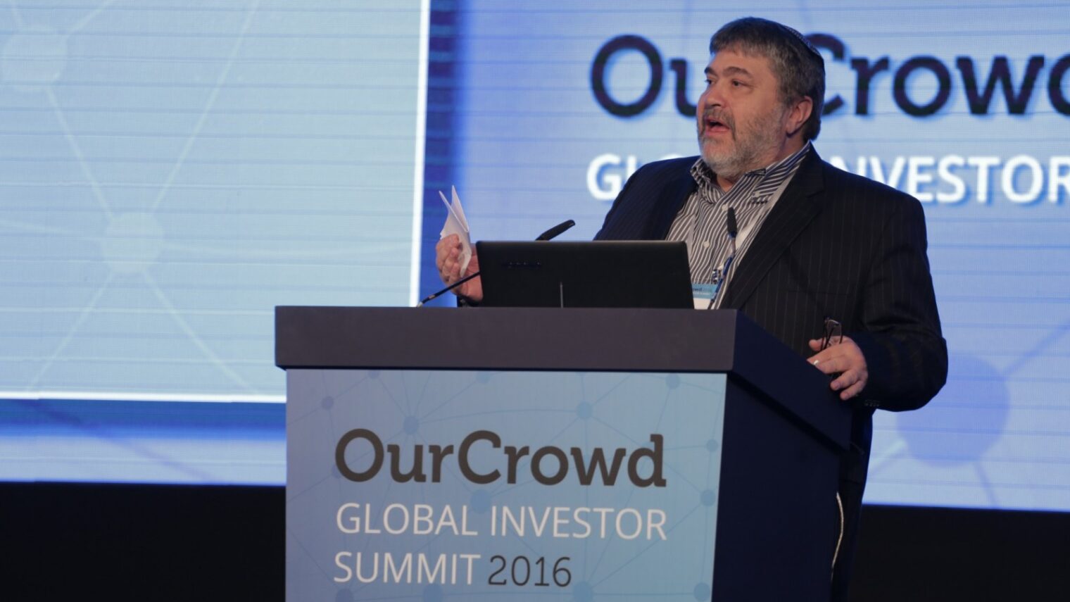 Jon Medved speaks to the audience at the 2016 OurCrowd Global Investor Summit in Jerusalem. Photo courtesy