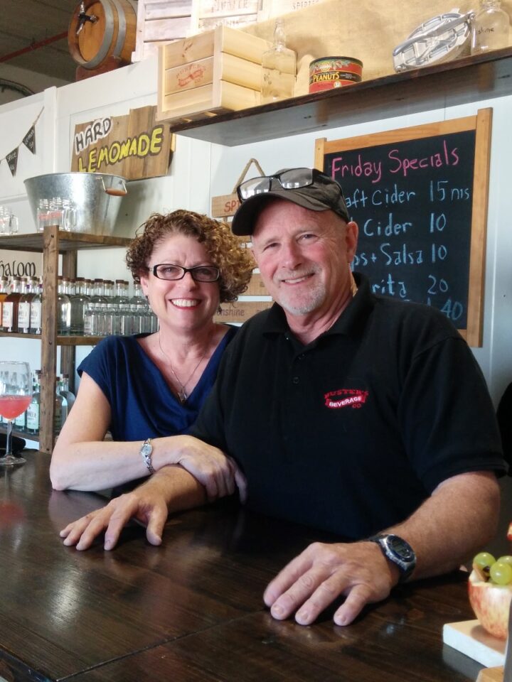 Pam and Denny Neilson at Busterâ€™s Beverage Company in Beit Shemesh. Photo by Abigail Klein Leichman