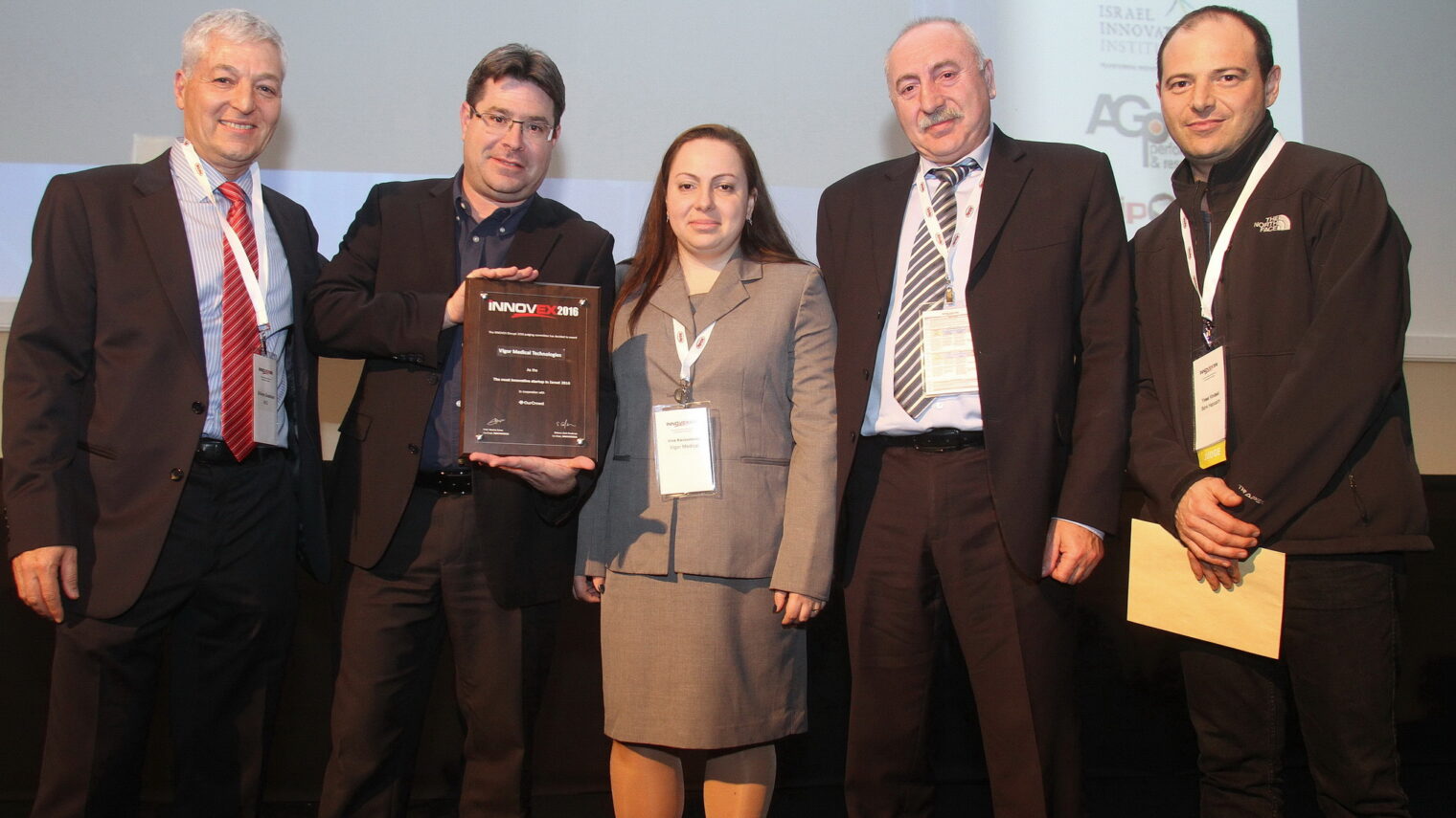 Vigor Medical cofounders Irina Kavounovski and Igor Vaysbeyn receiving the iNNOVEX Disrupt award from Minister of Science, Technology and Space Ofir Akunis on Feb. 3, 2016. Photo: courtesy