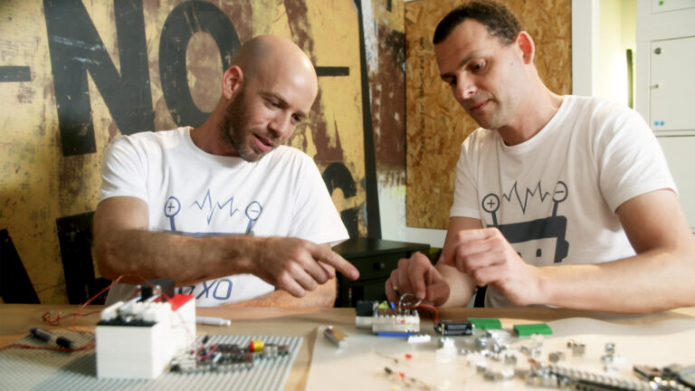 Founders Amir Saraf, left, and Boaz Almog playing with BRIXO. Photo courtesy
