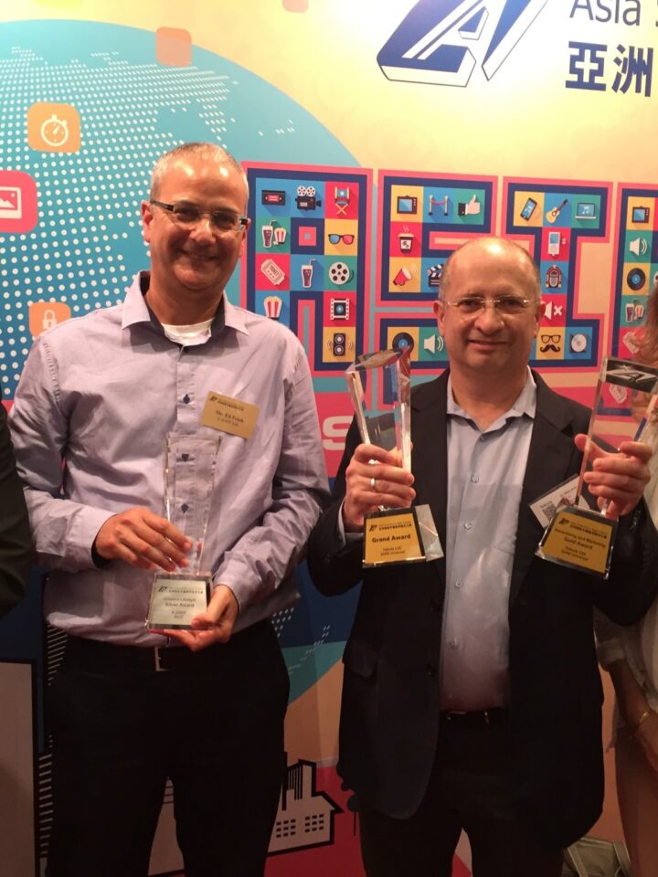 Gil Abramovich of Castle Builders, Eli Polak of Bazz, Dr. Viktor Ariel of Tekoia, and Nicky Blackburn, Editor of ISRAEL21c, at the Asia Smartphone App Contest in Hong Kong.