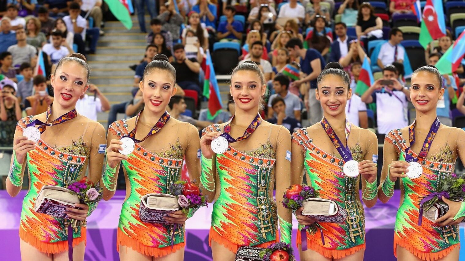 Israel’s rhythmic gymnastics teammates with their silver medals at the European Games in 2015. Photo by Robert Prezioso/Getty Images for BEGOC