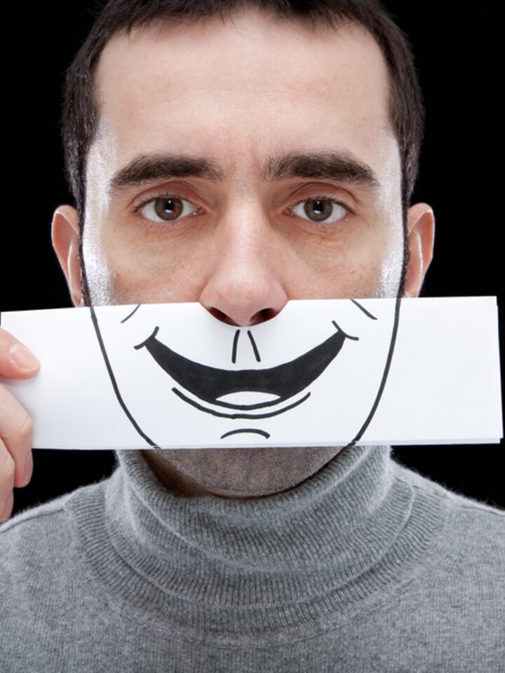 Is that a fake smile? Image via Shutterstock.com